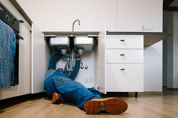 Professional Drain Cleaning technician working in Woodbine, GA